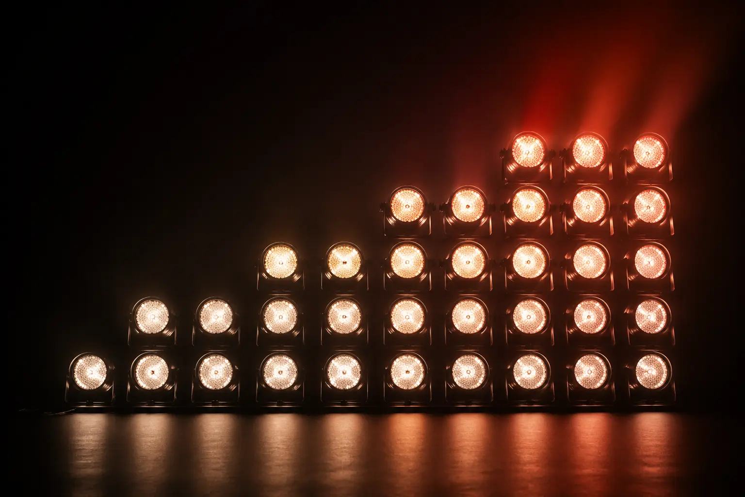 Forty stage lights arranged in a precise ascending formation